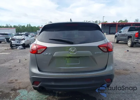 2014 Mazda Cx-5 Grand Touring z USA, uszkodzony, nr VIN JM3KE2DY9E0365894